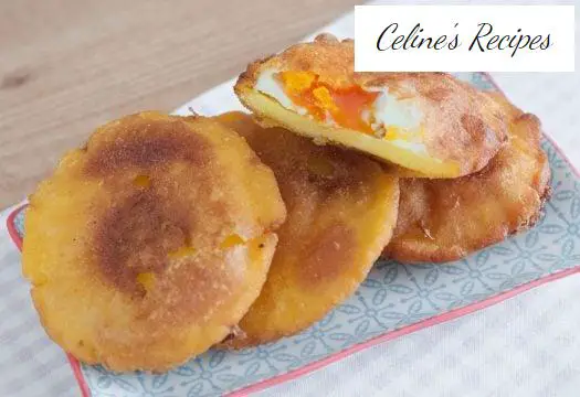 Fried arepas stuffed with egg