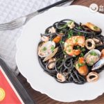 Spaghetti al nero di Sepia with baby eels and prawns