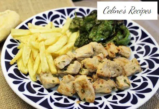 Raxo with potatoes and Padrón peppers