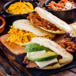 Fried arepas stuffed with egg