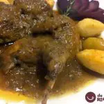 Stewed quail with a sauce of vegetables, apples and mushrooms