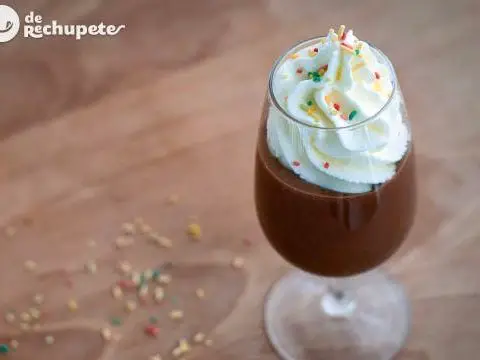 Glass of chocolate and homemade whipped cream