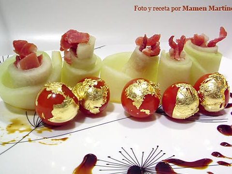 Melon salad with ham and cherry tomatoes in both colors