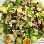 Salad with spinach sprouts, melon, sprouts and nuts