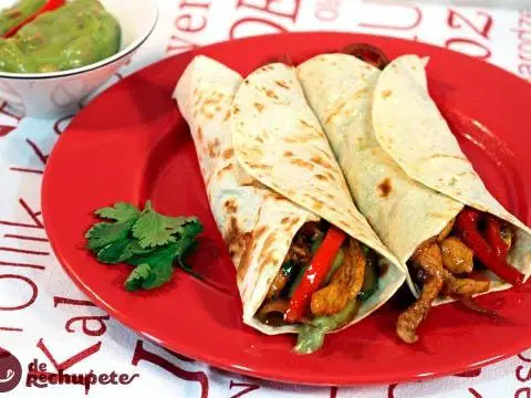 Mexican chicken fajitas with vegetables. Chicken fajitas