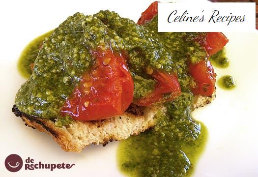 Roasted tomatoes on brioche with green pesto sauce