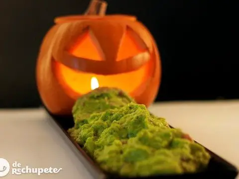 Pumpkin with guacamole. Halloween recipe