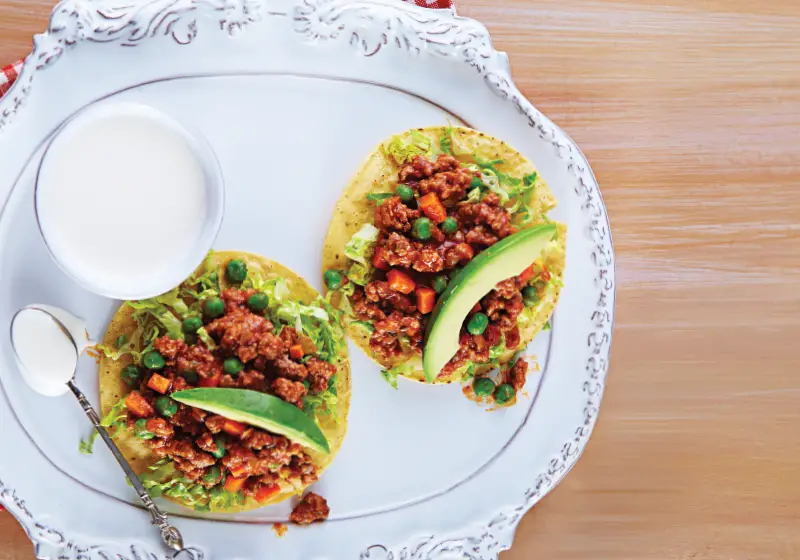 Ground beef picadillo tostadas with guajillo