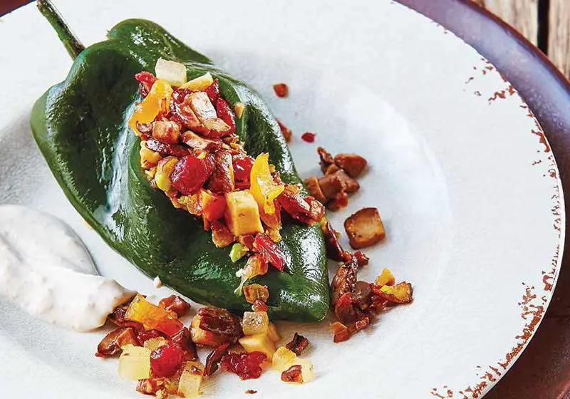 Vegetarian chiles en nogada with nuts