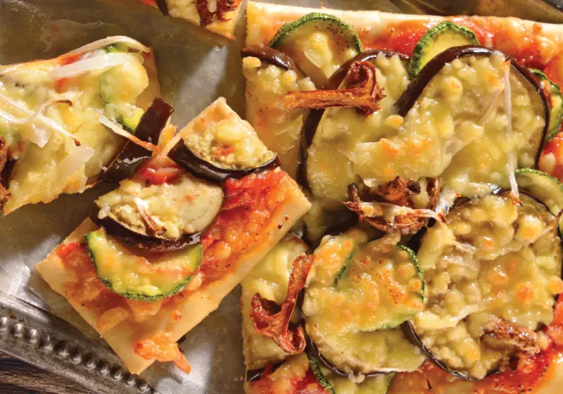 Vegetarian pizza with zucchini and mushrooms