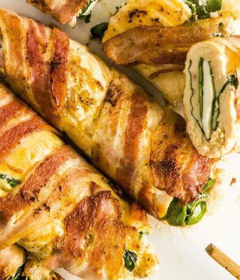 Chicken rolls stuffed with spinach and bacon