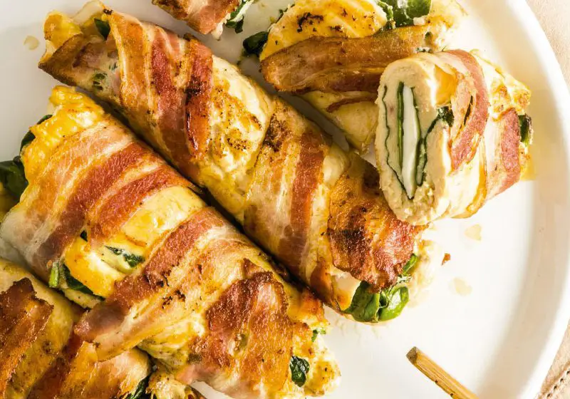 Chicken rolls stuffed with spinach and bacon